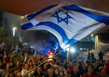 People block a road as they protest, calling for a deal for the immediate release of hostages held in the Gaza Strip by Hamas, in Tel Aviv, Israel, Sunday, Sept. 1, 2024. (AP Photo/Ohad Zwigenberg) AP Photo/Ohad Zwigenberg