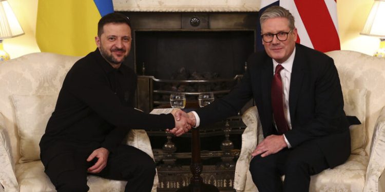 (Peter Nicholls/Pool Photo via AP)